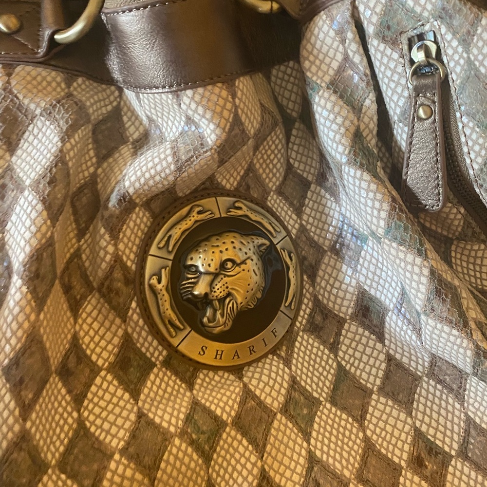 Sharif Leather Satchel Bag. Some wear on inside only.  This is a statement bag!